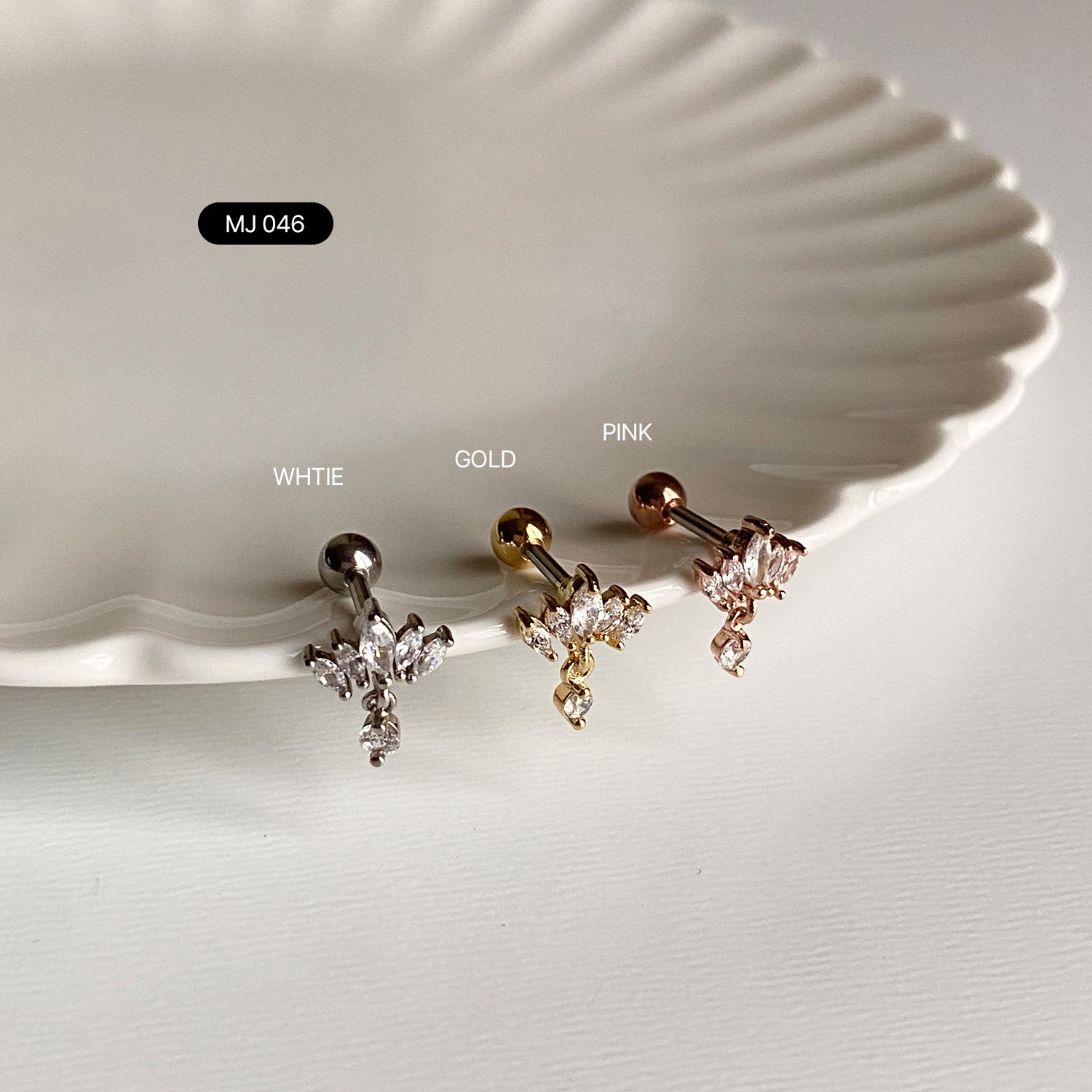 SET-027 サージカルキュービッククラウンエンジェルウィングセグメントリングピアセット