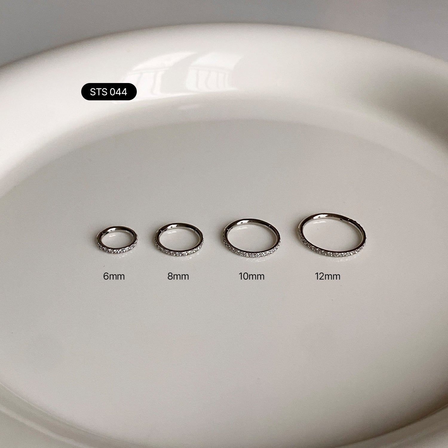 SET-027 サージカルキュービッククラウンエンジェルウィングセグメントリングピアセット