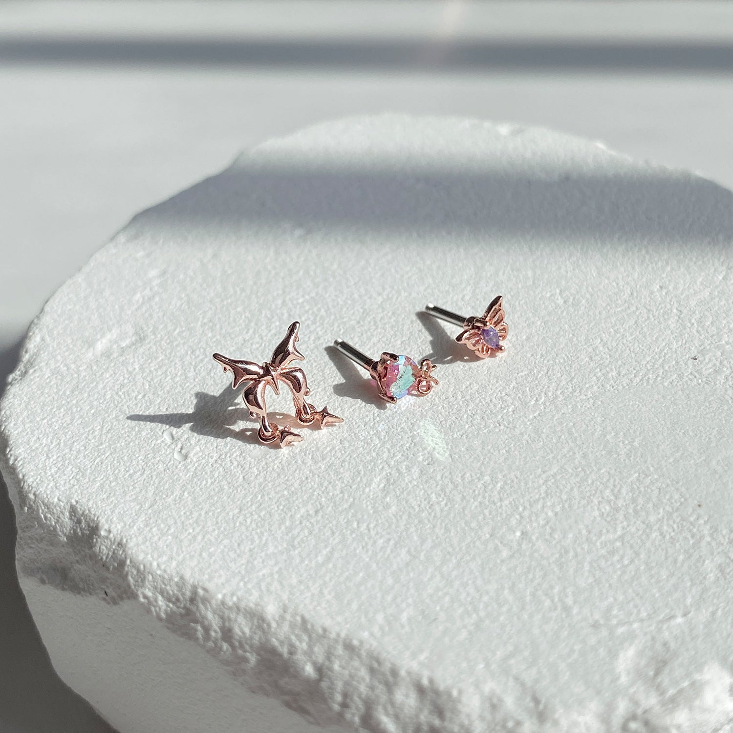 SET-063 オーロラドロップリボンハートナビキュービックピアスセット