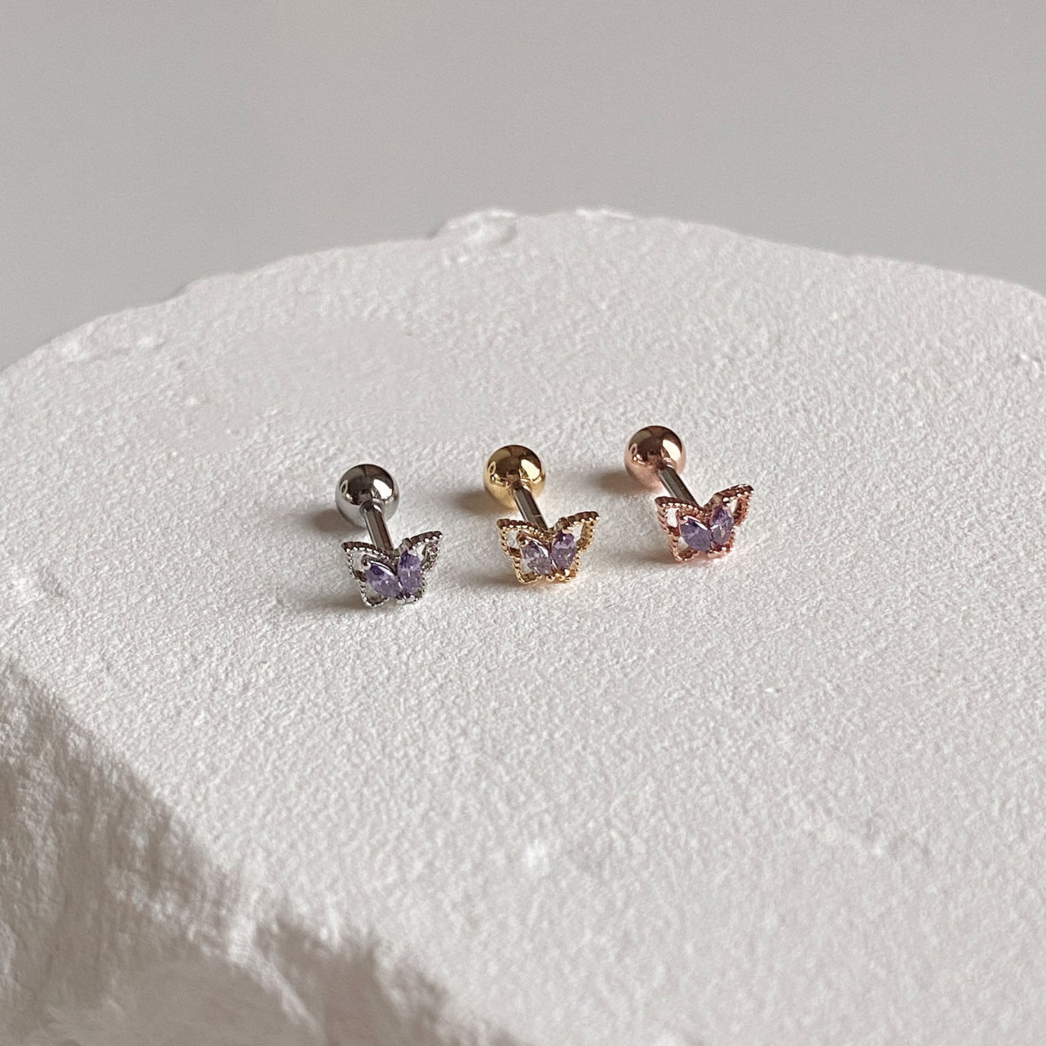 MJ 070 ツイストロープライン蝶キュービックピアス