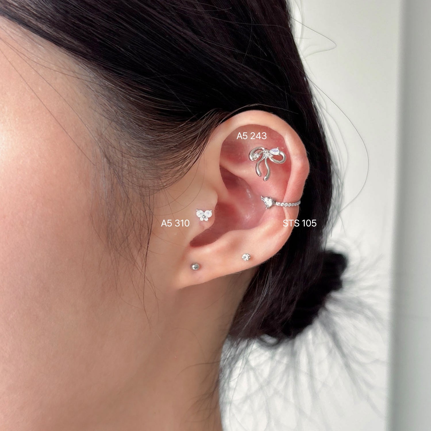 SET-072 ラインリボンシグメントリングキュービック蝶ピアセット