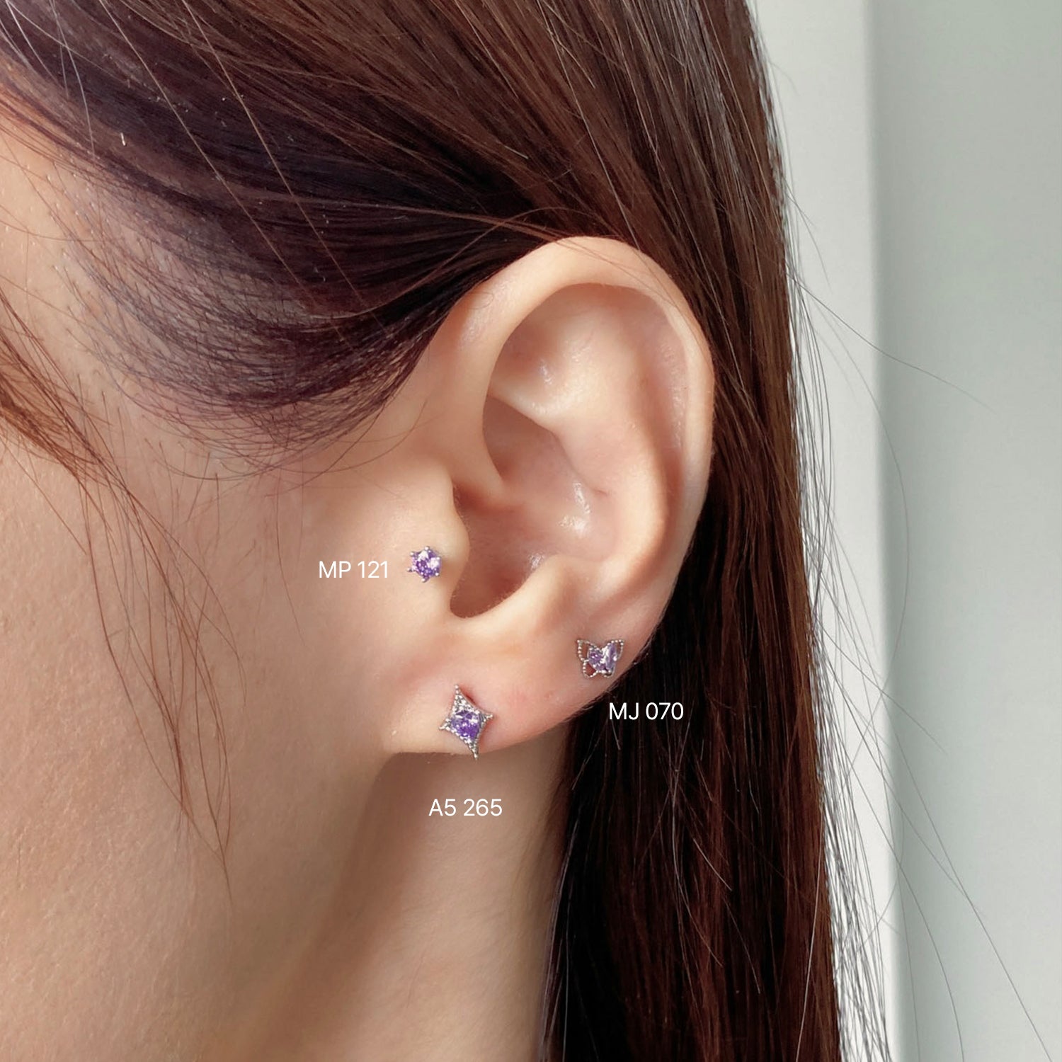 MJ 070 ツイストロープライン蝶キュービックピアス
