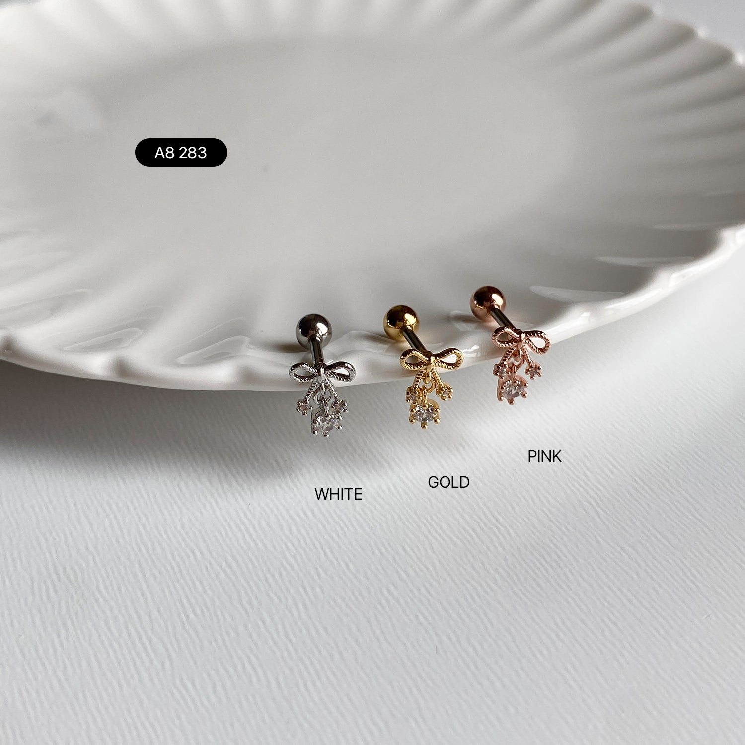 A8 283 ガラガラキュービックリボンピアス